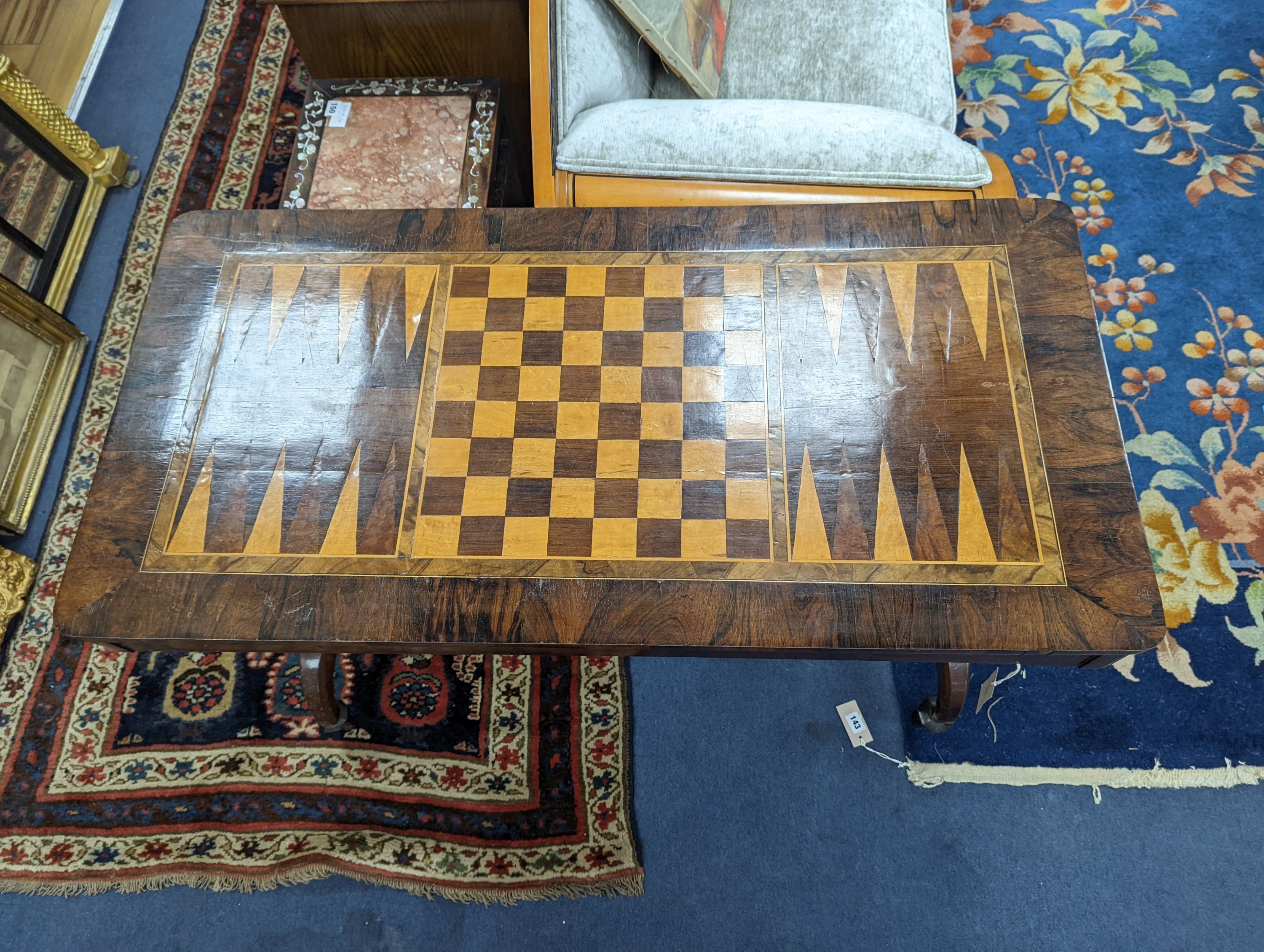 A Victorian rectangular parquetry inlaid rosewood and mahogany games table, width 106cm, depth 53cm, height 71cm